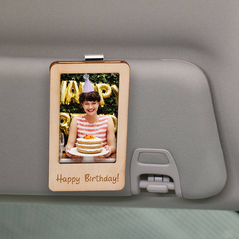 MadeMine personalized photo car sun visor clip with magnetic frame accessory, showing a custom photo displayed inside the clip.
