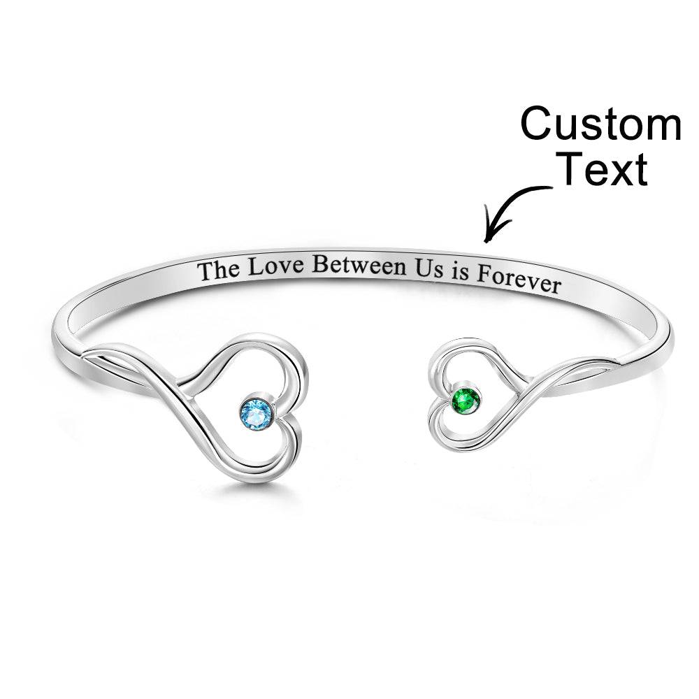 Custom double birthstone bracelet by MadeMine featuring two personalized gemstone stones and silver chain jewelry.