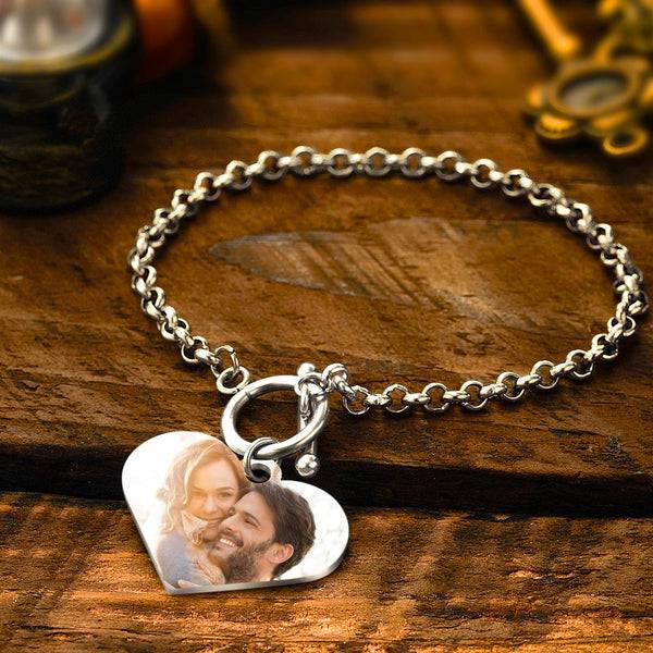 MadeMine custom photo charm bracelet with heart and QR code, featuring detailed metal links and engraved heart pendant.