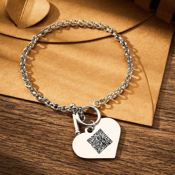 MadeMine custom photo charm bracelet with heart and QR code, featuring a silver bracelet and personalized photo charm.