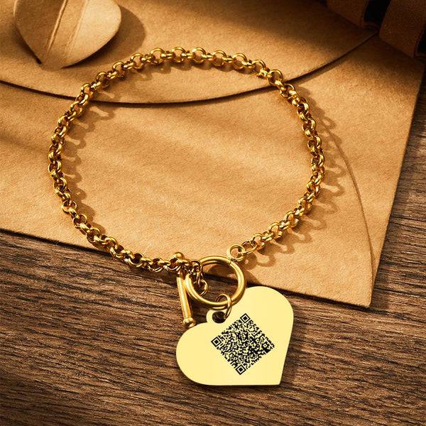 MadeMine custom photo charm bracelet with heart and QR code jewelry, featuring engraved charms on a delicate bracelet.