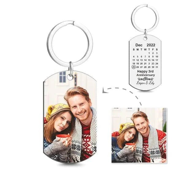 MadeMine engraved keychain with custom anniversary date design, made of metal, featuring engraved personalized text and decorative elements.
