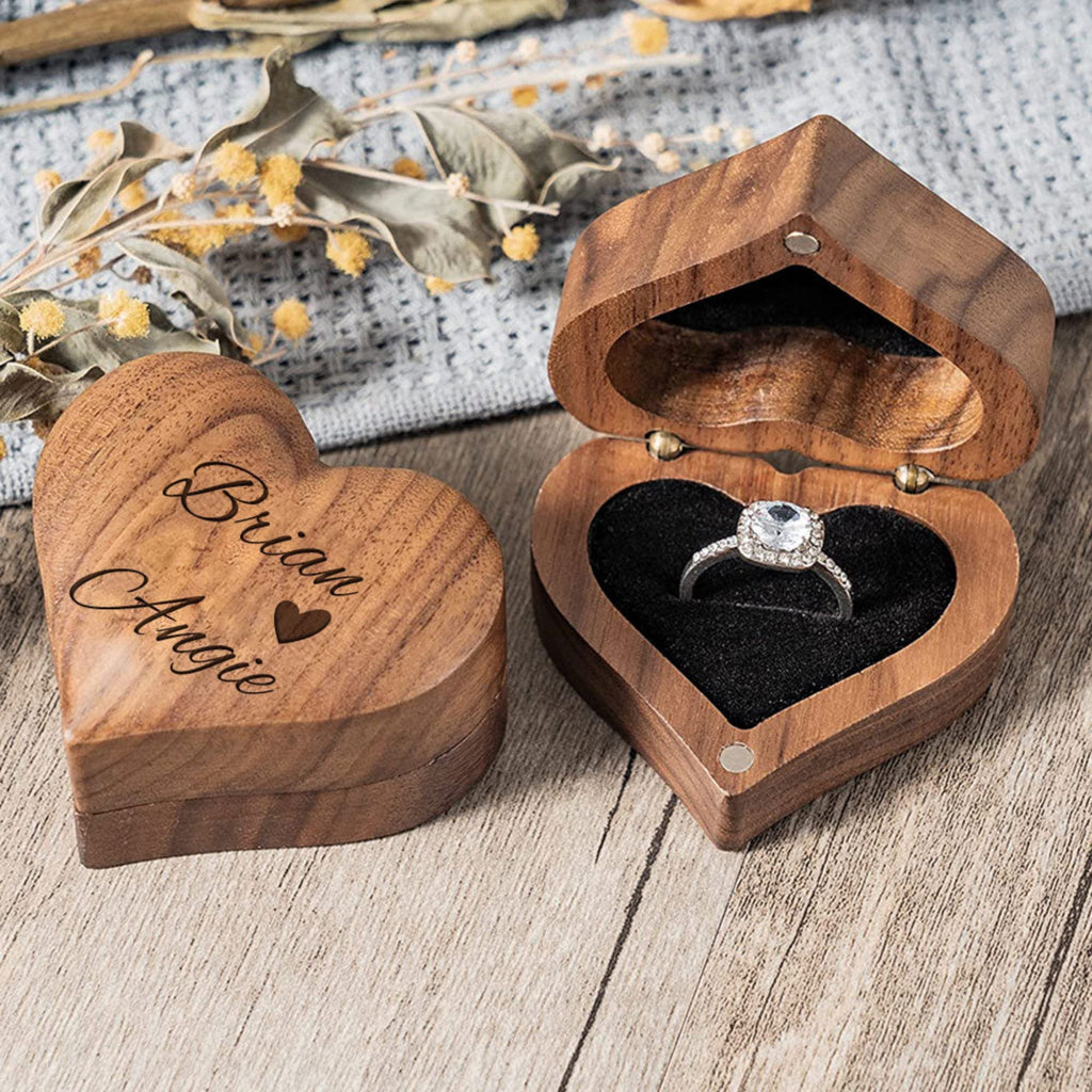 Personalized wooden heart-shaped ring box by MadeMine, perfect for proposal and engagement gifts, with engraved detail and elegant design.