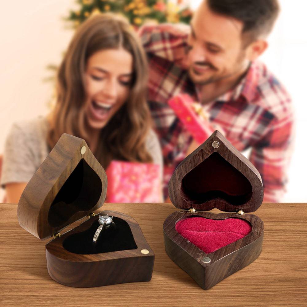 Personalized wooden heart ring box from MadeMine, with smooth finish and engraved message, ideal for proposal engagement gifts.