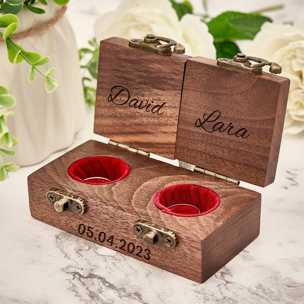 Personalized wooden ring box from MadeMine with custom engraving, designed for holding double wedding rings.