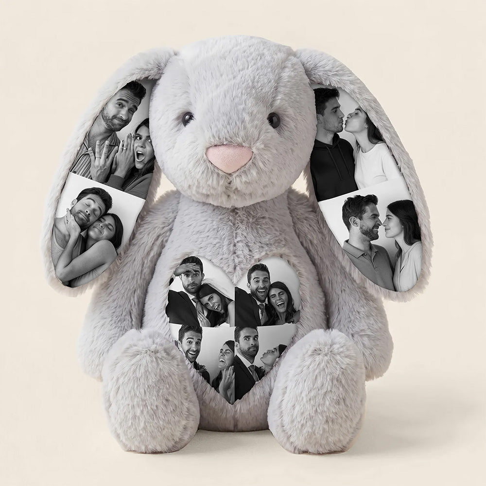 Gray plush bunny with cutout sections for photos on a beige background