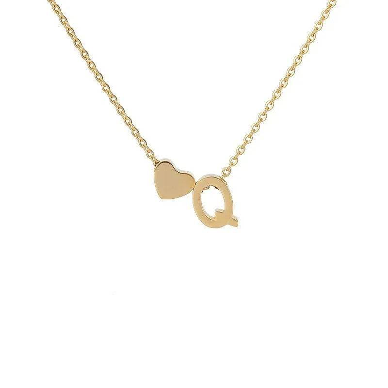 MadeMine tiny heart initial necklace with personalized charm, perfect Mother’s Day gift for mom or grandma, close-up view.