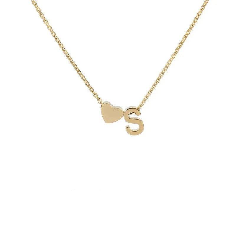 MadeMine Tiny Heart Initial Necklace featuring personalized heart charm, perfect Mother's Day gift for mom or grandma.