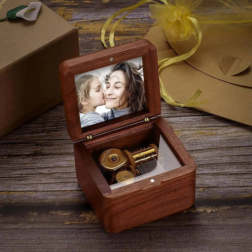 Personalized wooden music box by MadeMine featuring vintage design and romantic keepsake with engraved photo display.