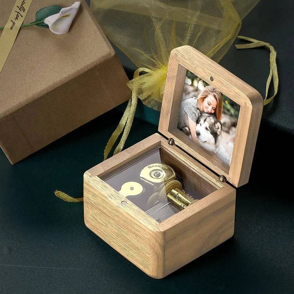 Personalized wooden music box by MadeMine featuring a vintage design and romantic photo engraving, ideal as a keepsake.