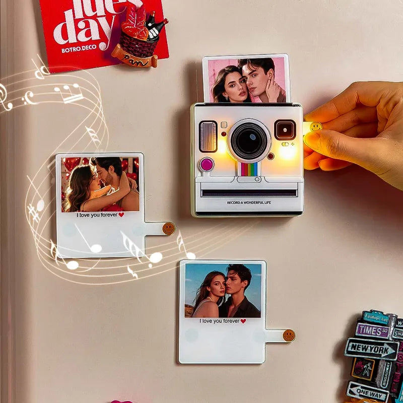 Polaroid-style camera with instant photos on a decorative wall with 'love day' poster.