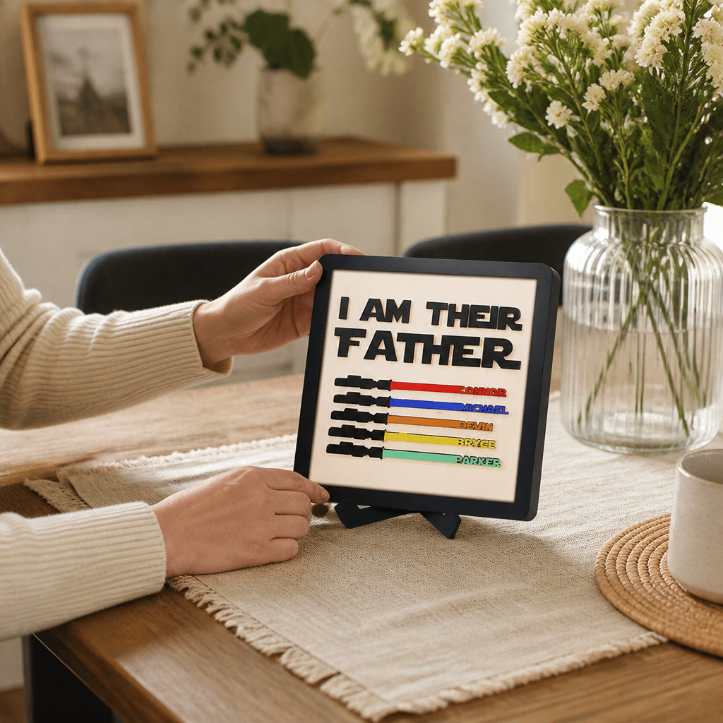 Personalized Wooden Lightsaber Plaque – I Am Their Father · Hands Interacting with Plaque at Dining Table